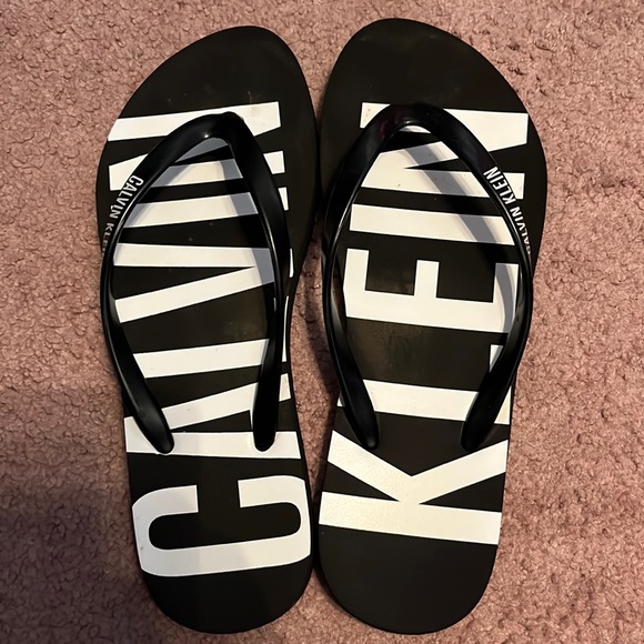 Calvin Klein Shoes - Black and white Calvin Klein flip-flops